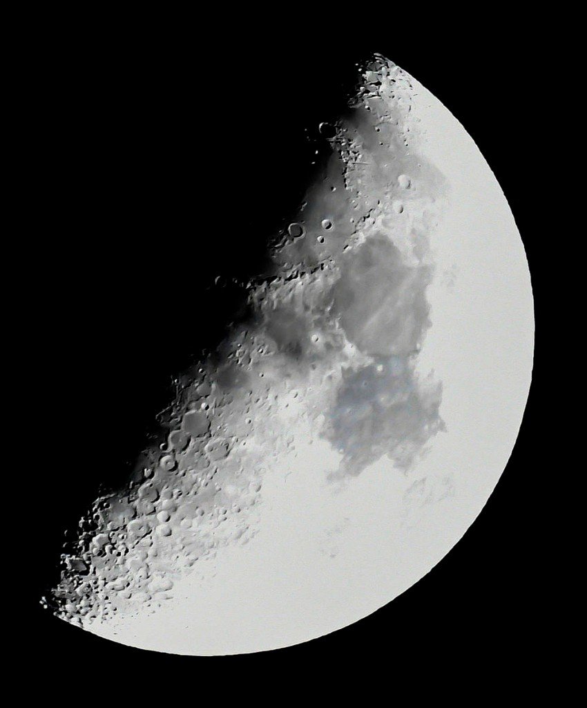 A detailed waxing gibbous Moon against black space, with craters and maria visible along the terminator.